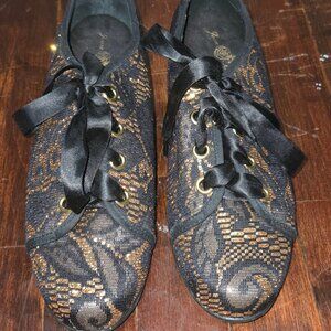 Joan Boyce Black and Gold Sneaker